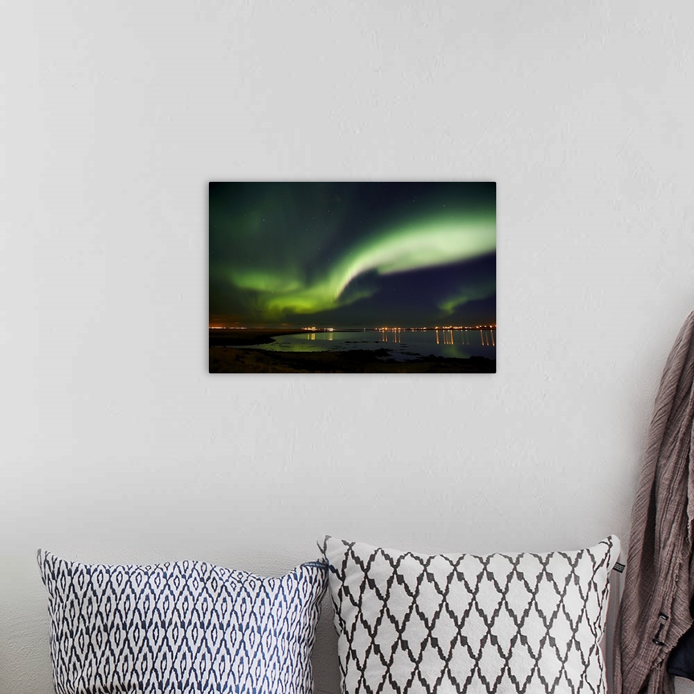 A bohemian room featuring Aurora Borealis in the sky, Alftanes, Reykjavik, Iceland