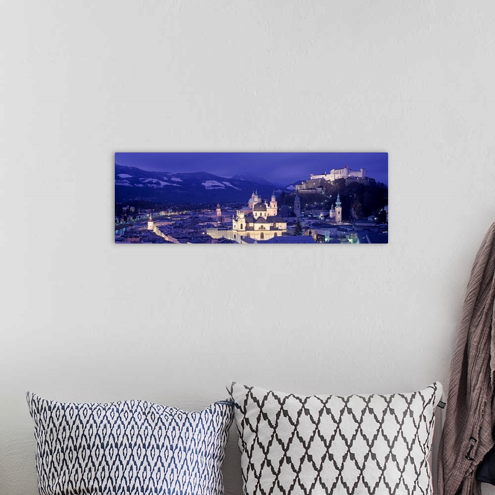A bohemian room featuring Austria, Salzburg, Aerial view of a city at night