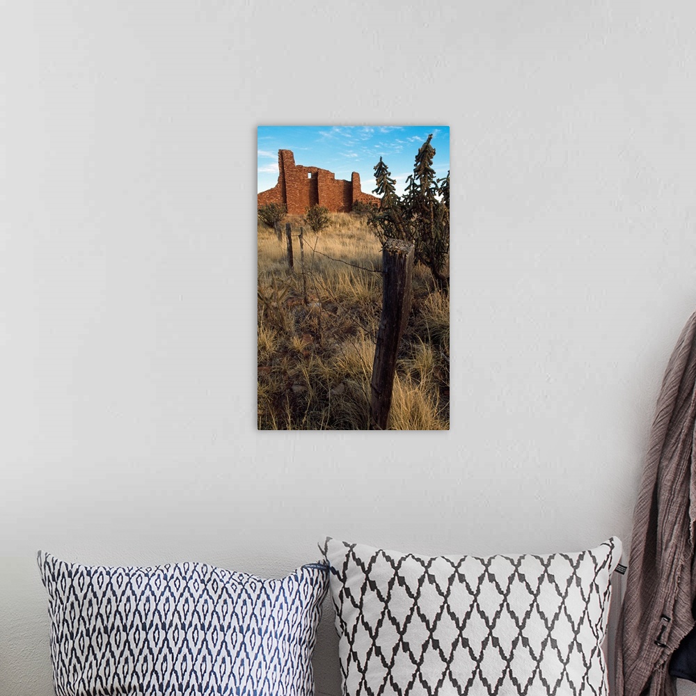 A bohemian room featuring Barbed-wire fence line, hilltop ruins, New Mexico