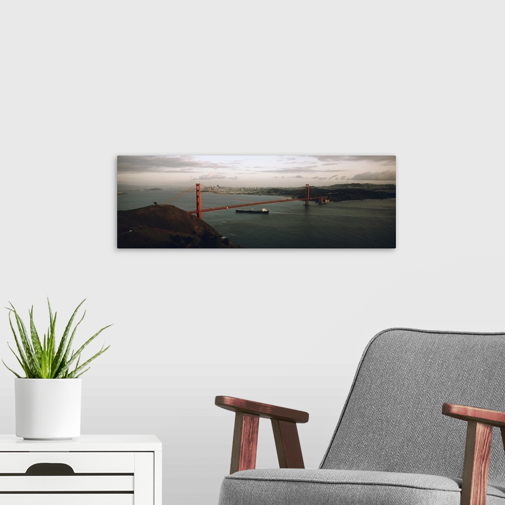 A modern room featuring Barge passing under a bridge, Golden Gate Bridge, San Francisco, California