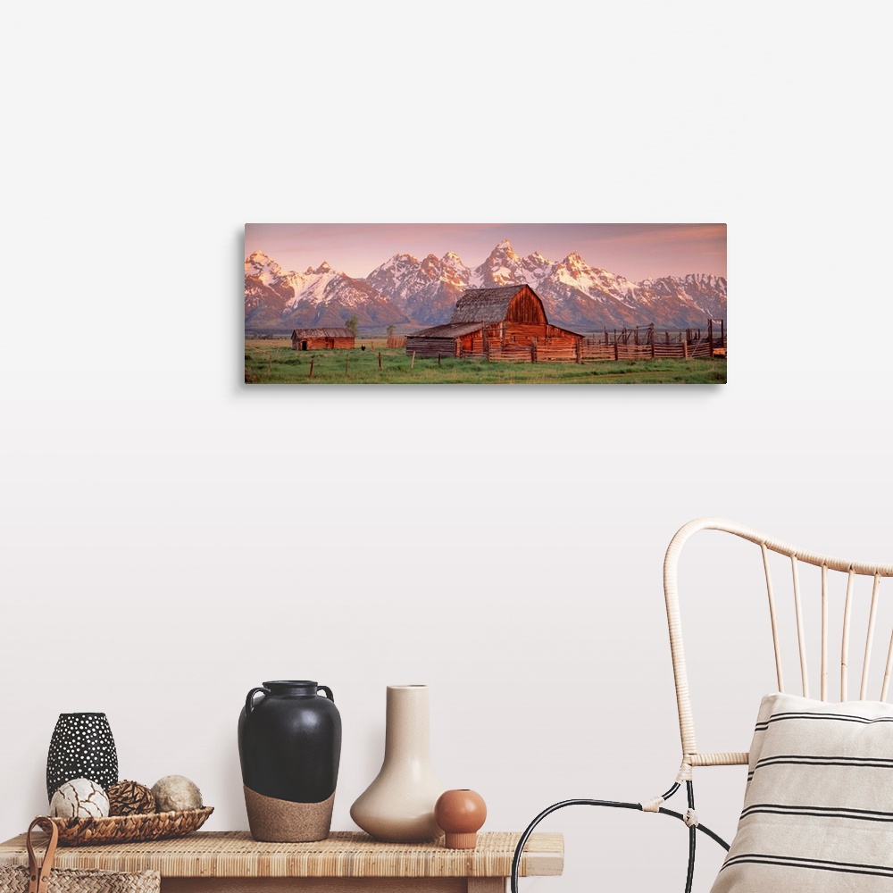 A farmhouse room featuring Panoramic photograph of a large barn on a farm in Grand Teton National Park in Wyoming. Located i...