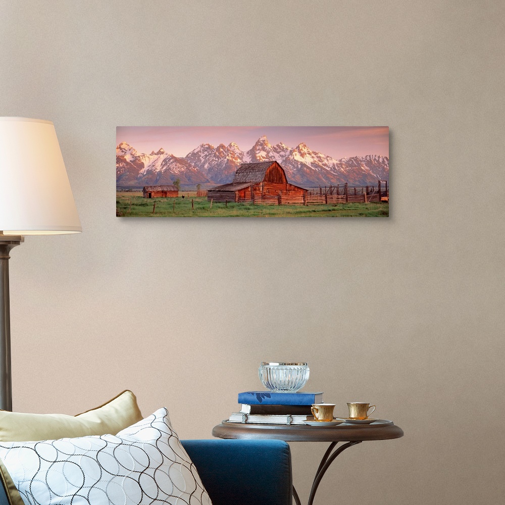 A traditional room featuring Panoramic photograph of a large barn on a farm in Grand Teton National Park in Wyoming. Located i...