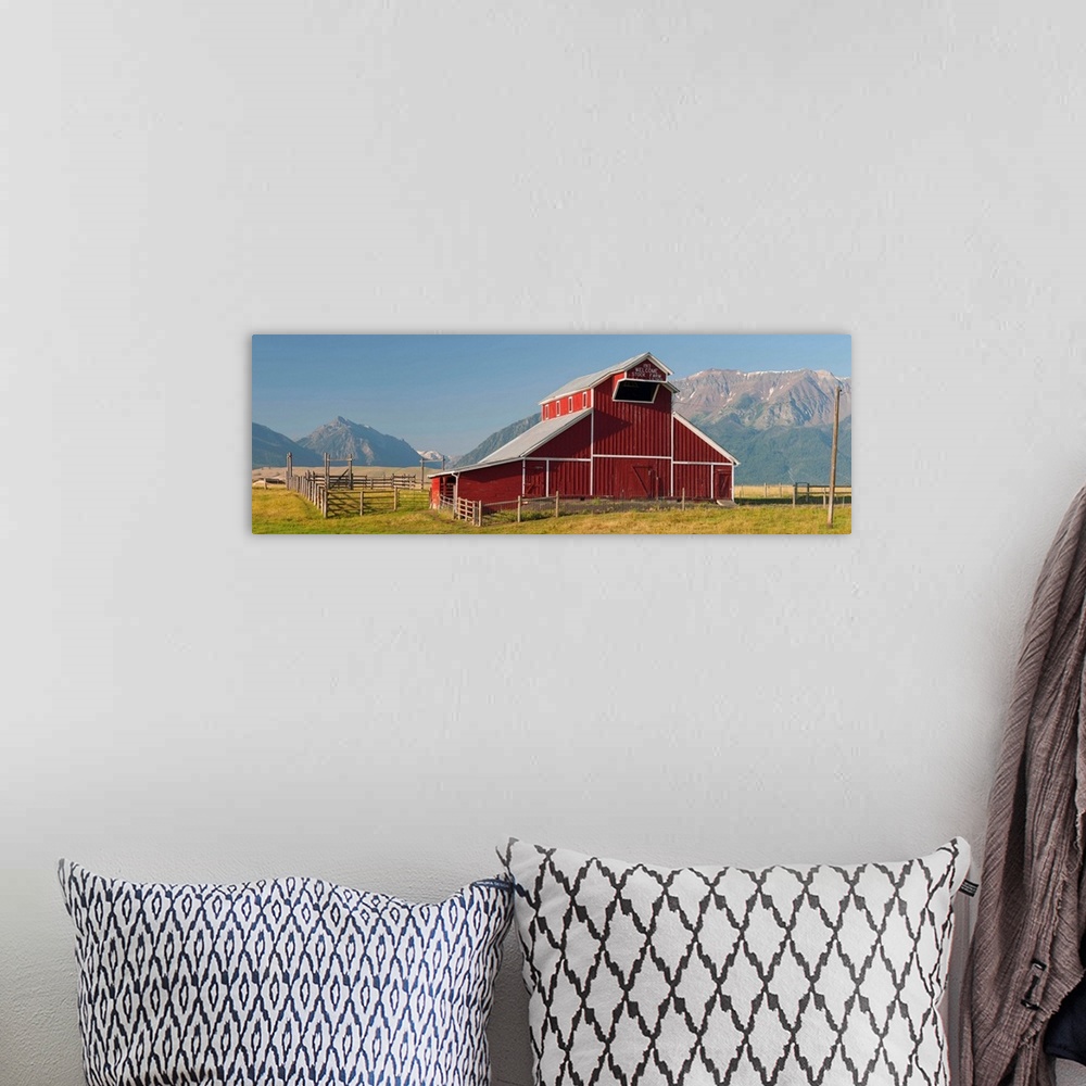 A bohemian room featuring Barn in a field with Wallowa Mountains in background, Enterprise, Oregon