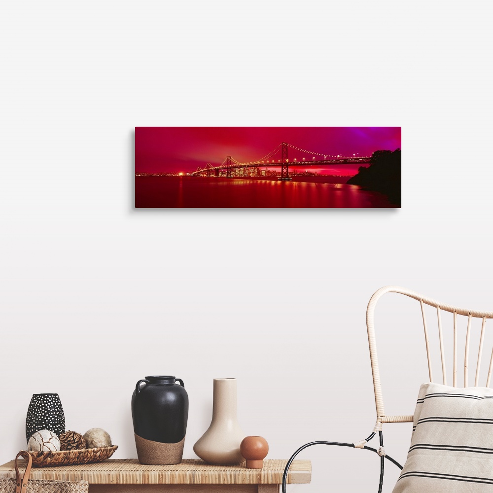 A farmhouse room featuring This panoramic landscape photograph was taken at just time of day to turn the sky a brilliant hot...