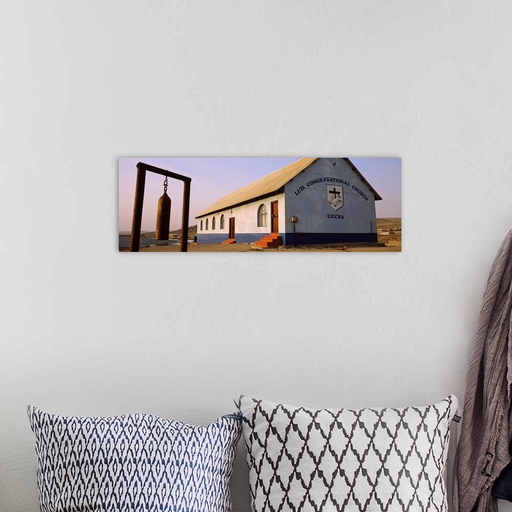 A bohemian room featuring Bell in front of a church Luderitz Karas Region Namibia