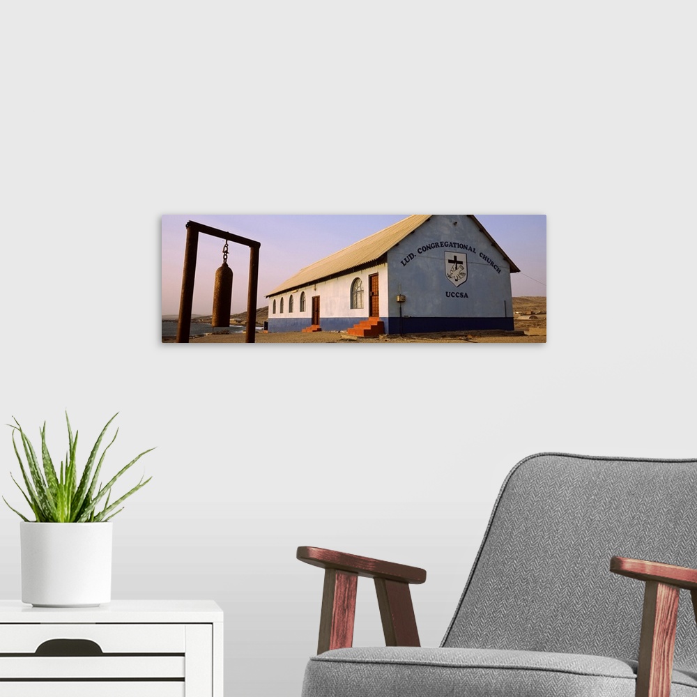 A modern room featuring Bell in front of a church Luderitz Karas Region Namibia