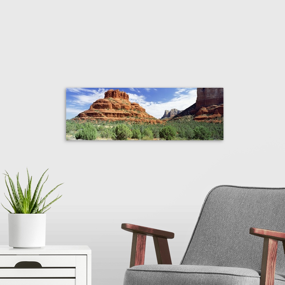A modern room featuring Panoramic photo on canvas of big rock formations in the desert.