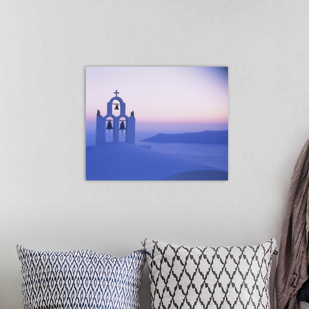 A bohemian room featuring Bell tower of a church at sunset, Santorini, Greece