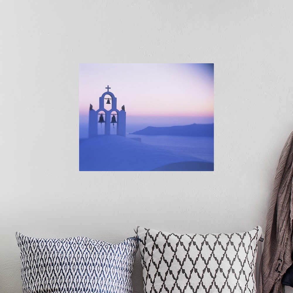 A bohemian room featuring Bell tower of a church at sunset, Santorini, Greece