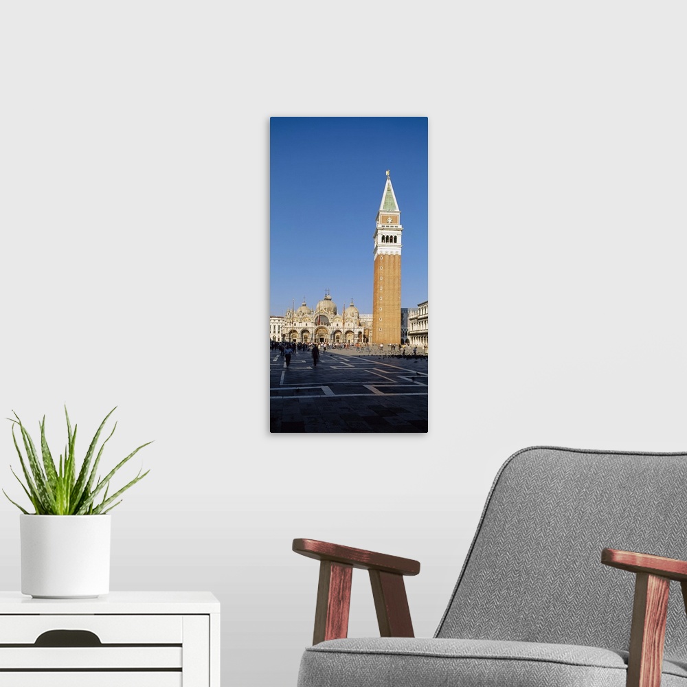 A modern room featuring Bell tower with a cathedral in the background, St. Marks Cathedral, Venice, Italy