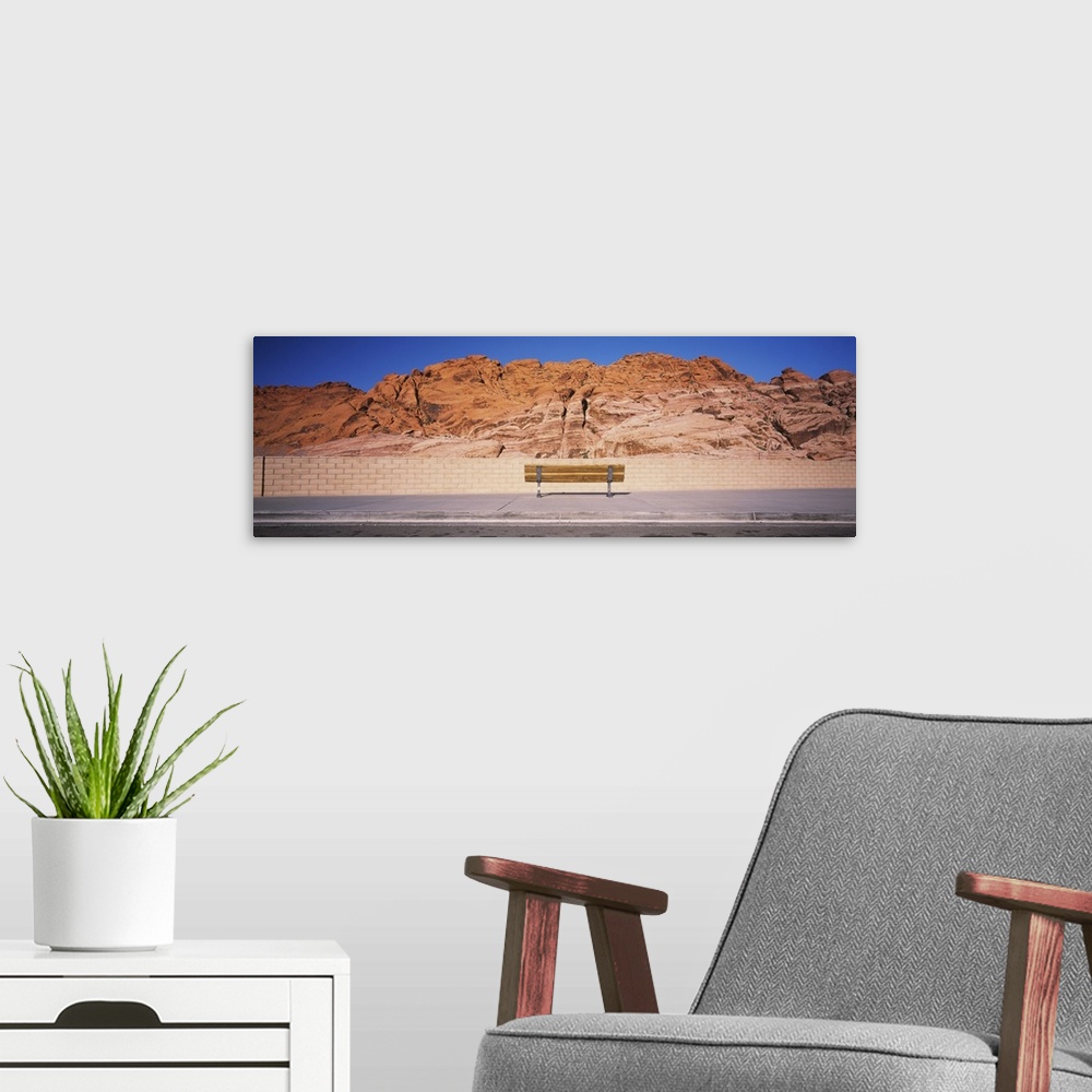 A modern room featuring Bench in front of rocks, Red Rock Canyon State Park, Nevada
