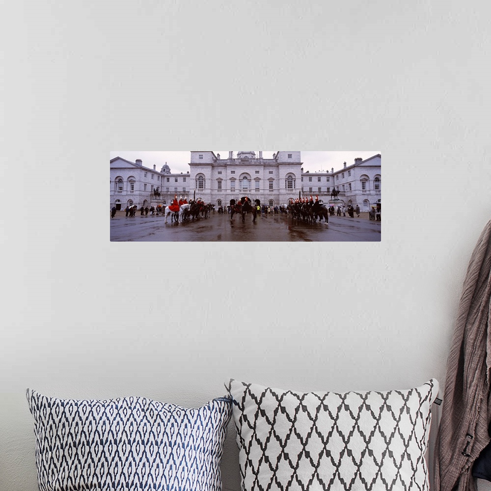 A bohemian room featuring Black horse guards in front of a building, London, England
