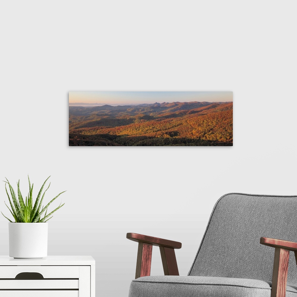 A modern room featuring Panorama of sunlight falling on the rolling hills along the Blue Ridge Parkway in North Carolina.