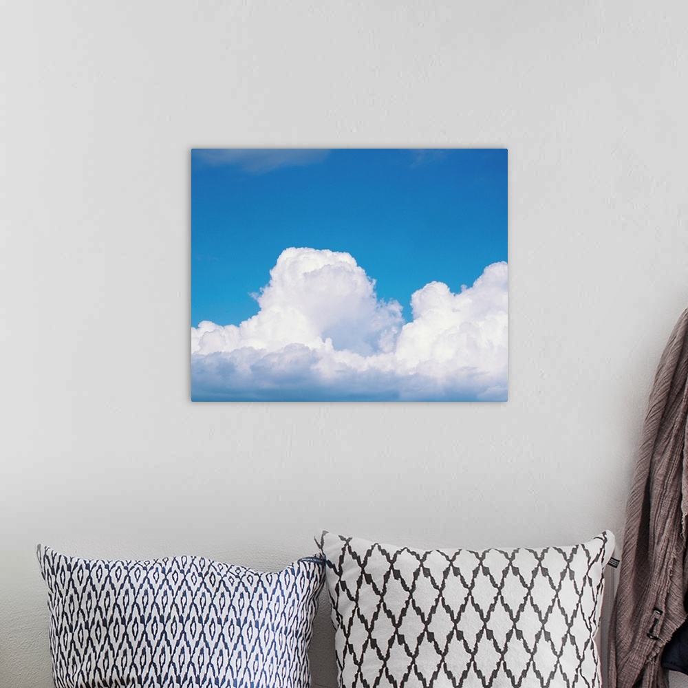 A bohemian room featuring Blue sky and cumulus clouds