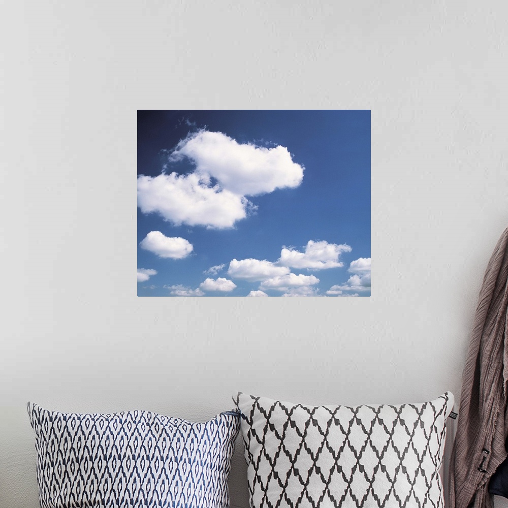 A bohemian room featuring Blue sky and cumulus clouds II