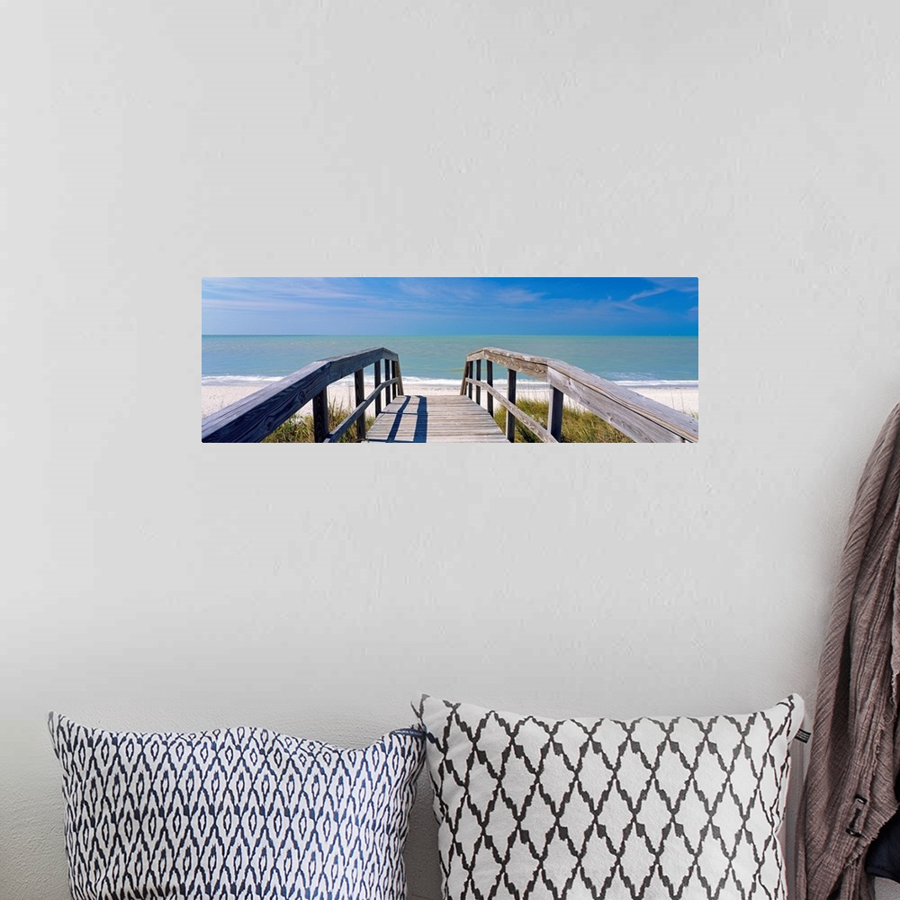 A bohemian room featuring Wall art for the home or office this panoramic photograph shows a boardwalk over dunes to a sandy...