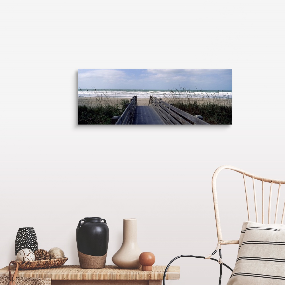 A farmhouse room featuring A wide panoramic photograph on canvas perfect for hanging in a living or dining room of a view do...