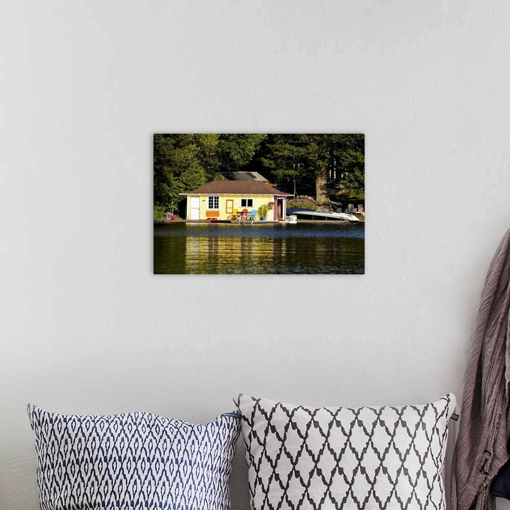 A bohemian room featuring Boathouse at the lakeside, Lake Muskoka, Ontario, Canada