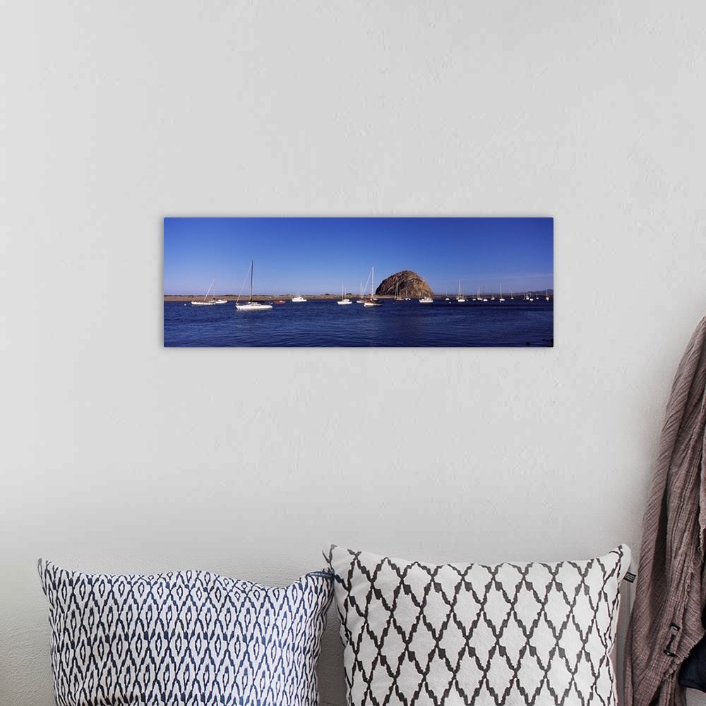 A bohemian room featuring Boats at a harbor with rock in the background Morro Rock Morro Bay California