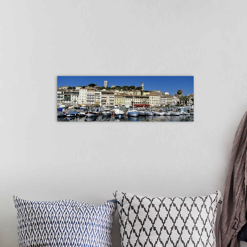 A bohemian room featuring Boats docked at a harbor, Cannes, French Riviera, France