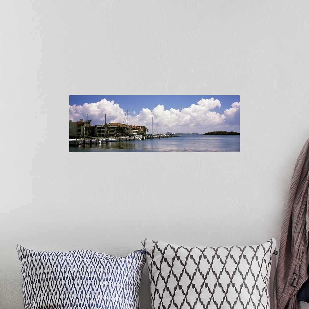 A bohemian room featuring Boats docked in a bay Cabbage Key Sunshine Skyway Bridge in Distance Tampa Bay Florida