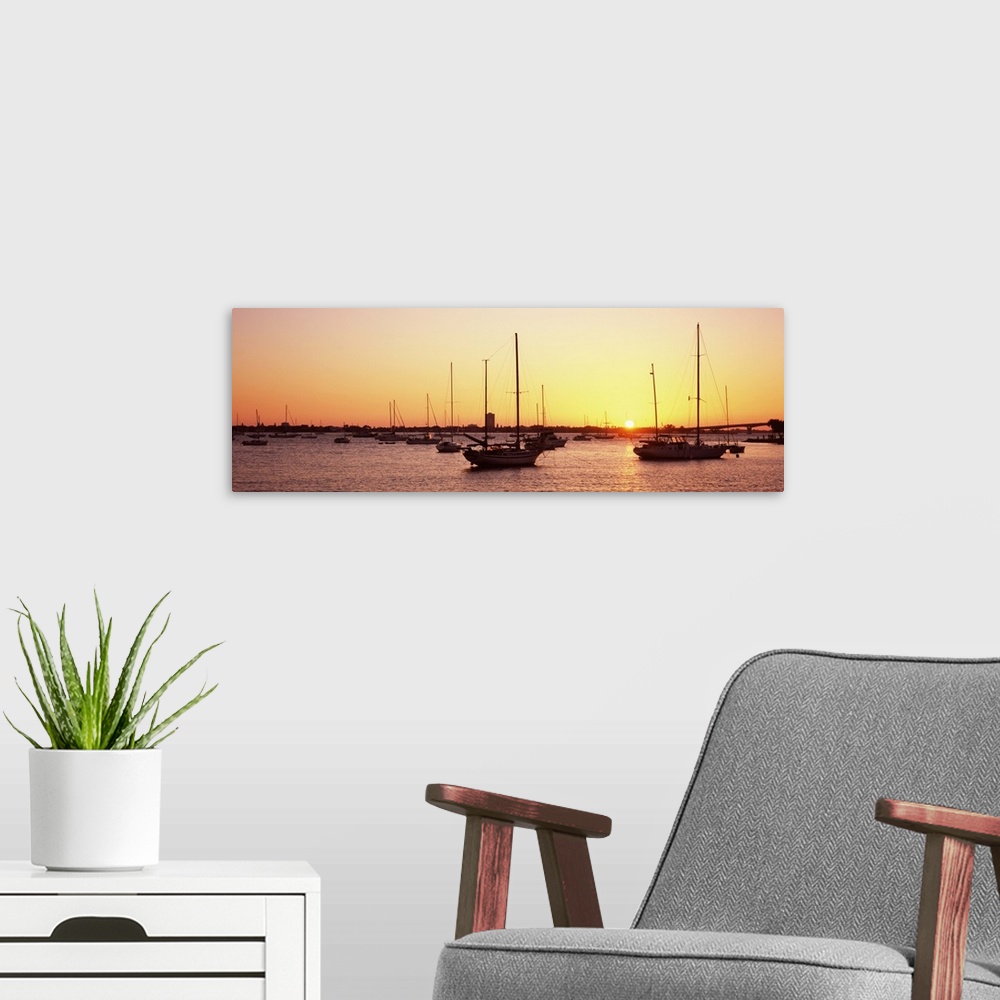 A modern room featuring Sunset over Sarasota Bat, Gulf of Mexico, Sarasota, Florida