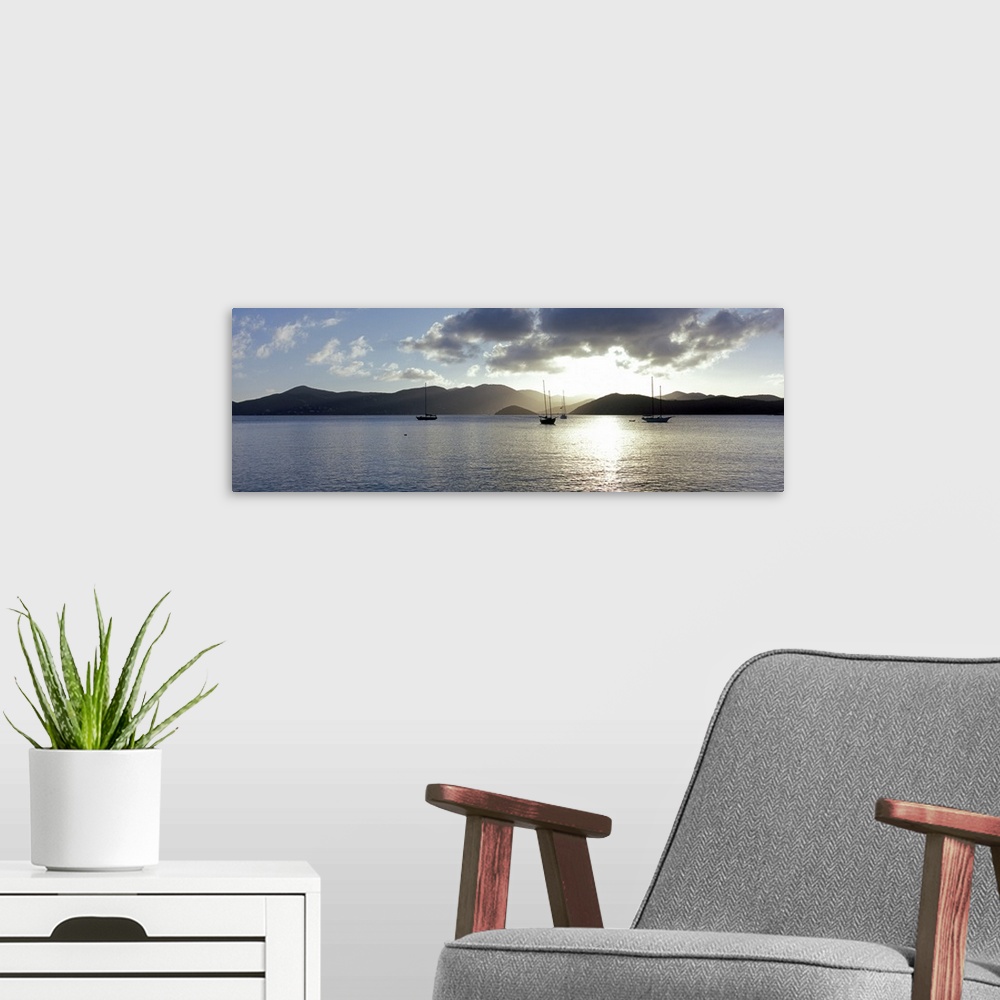 A modern room featuring Boats in the sea at sunset, Coral Bay, St. John, US Virgin Islands