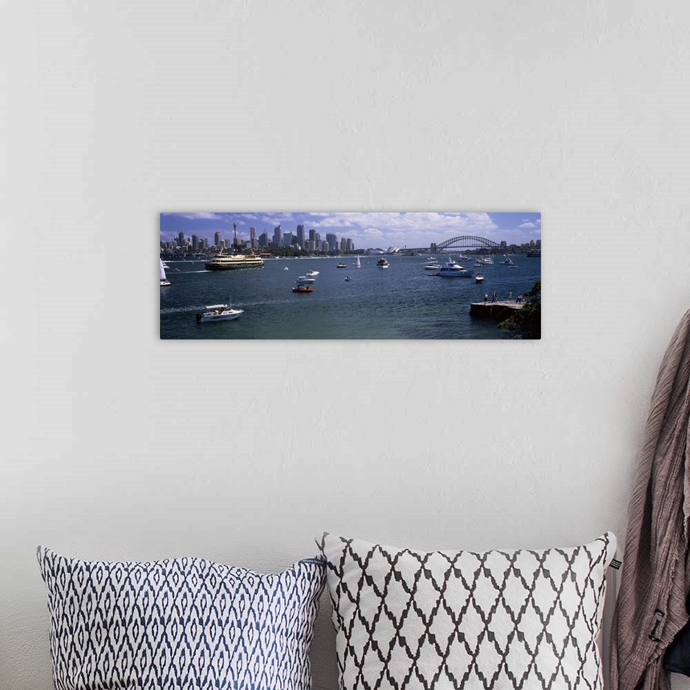 A bohemian room featuring Boats in the sea with a bridge in the background, Sydney Harbor Bridge, Sydney Harbor, Sydney, Ne...