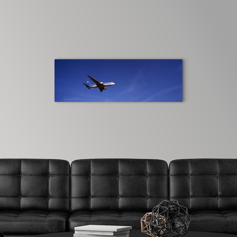 A modern room featuring Boeing 767 Airplane In Flight