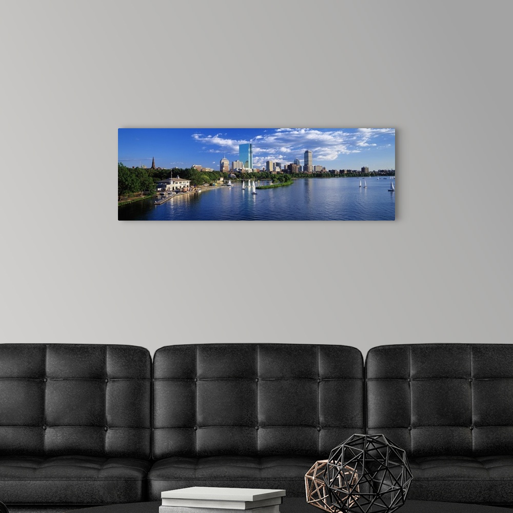 A modern room featuring Panoramic photograph taken of a variety of sailboats and other water vessels within a harbor foun...