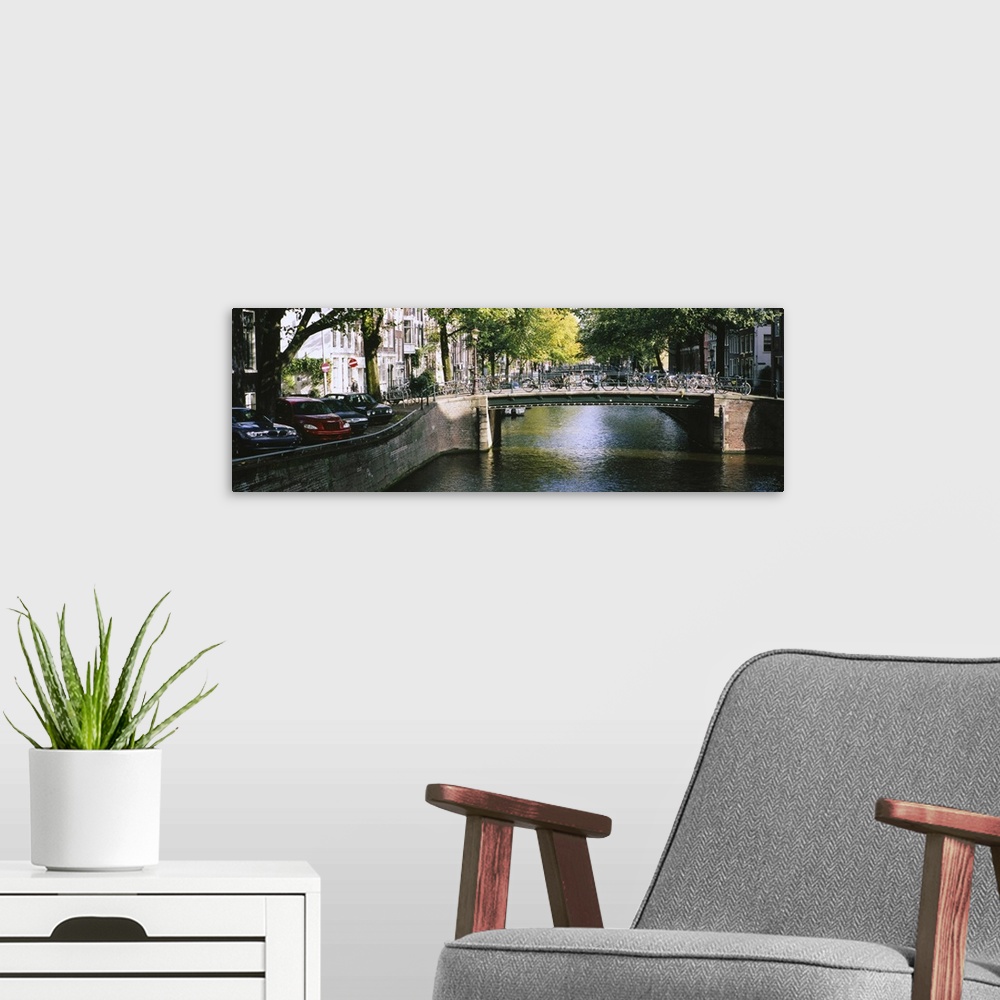 A modern room featuring Bridge across a channel, Amsterdam, Netherlands
