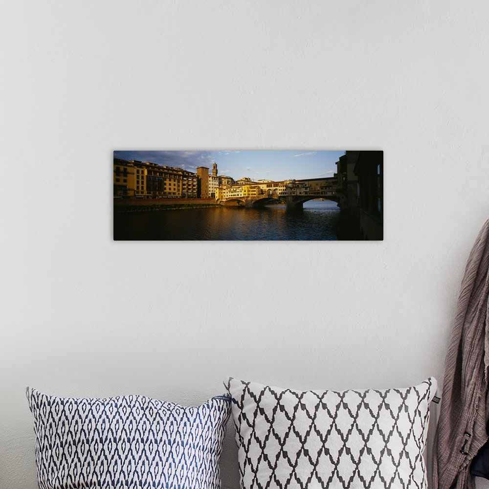 A bohemian room featuring Bridge across a river, Arno River, Ponte Vecchio, Florence, Italy