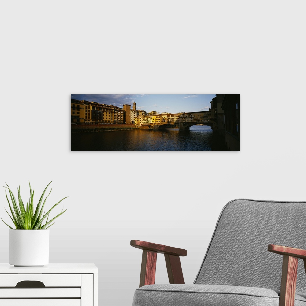 A modern room featuring Bridge across a river, Arno River, Ponte Vecchio, Florence, Italy