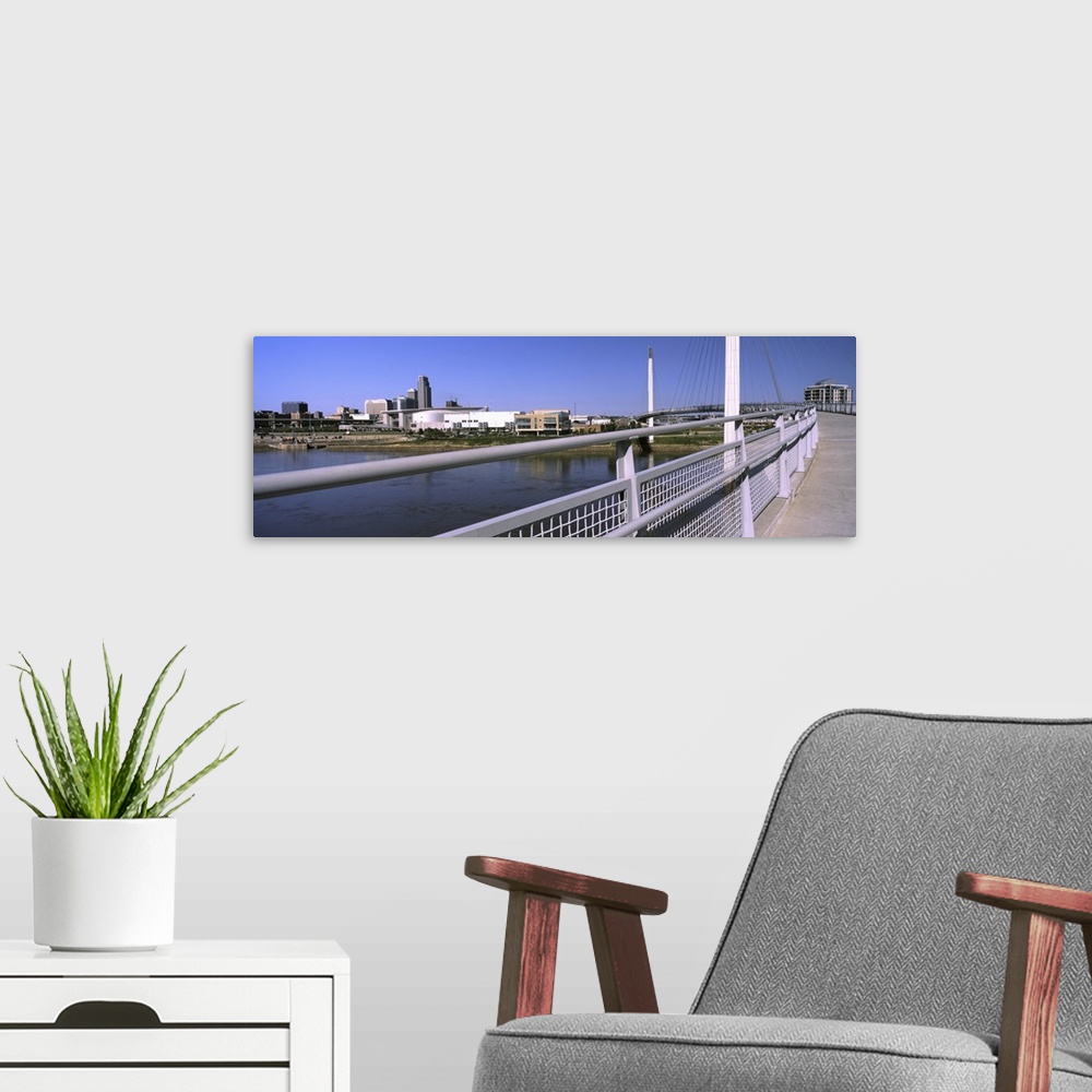 A modern room featuring Bridge across a river, Bob Kerrey Pedestrian Bridge, Missouri River, Omaha, Nebraska