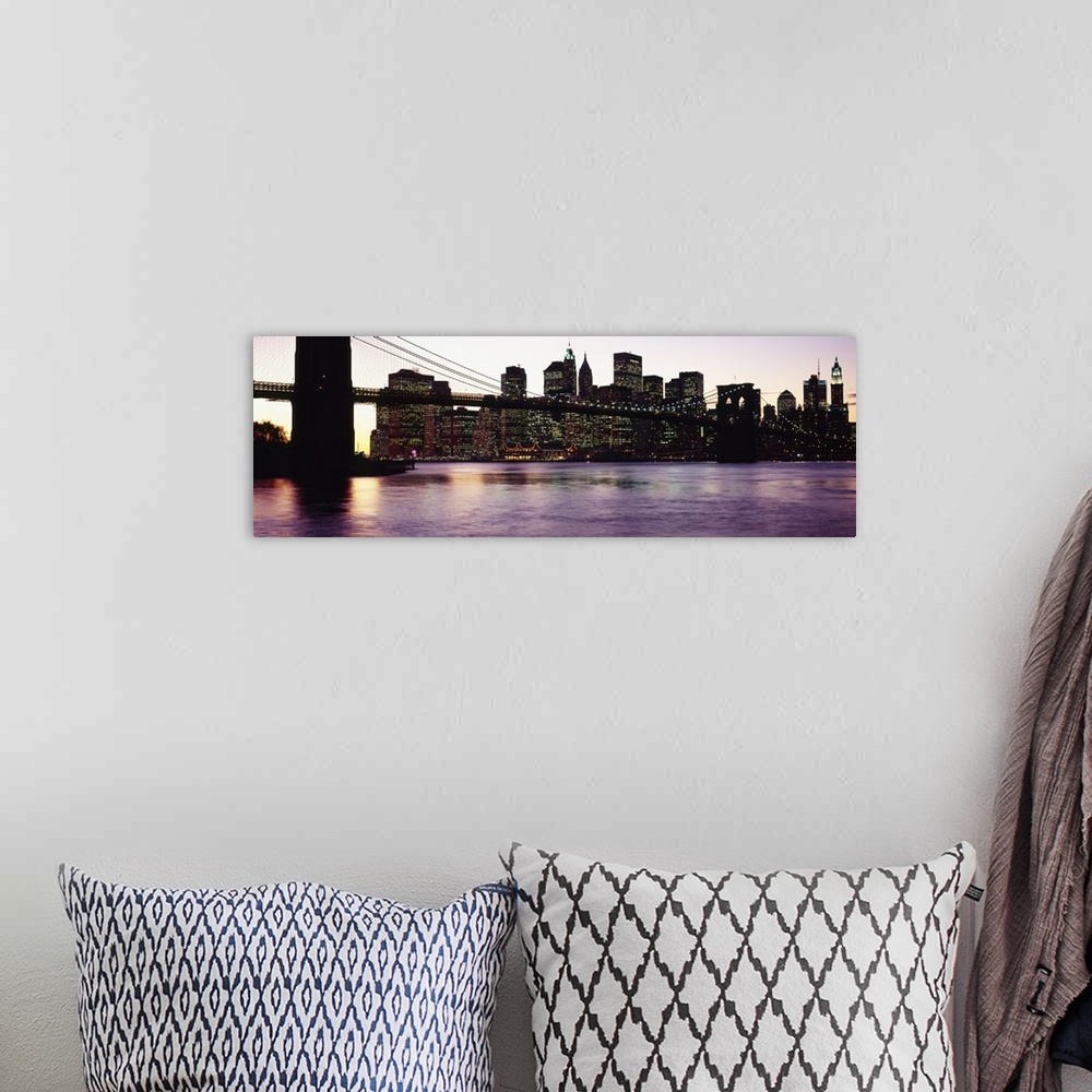 A bohemian room featuring This decorative wall art is a panoramic photograph taken from ground level of the base of the sus...