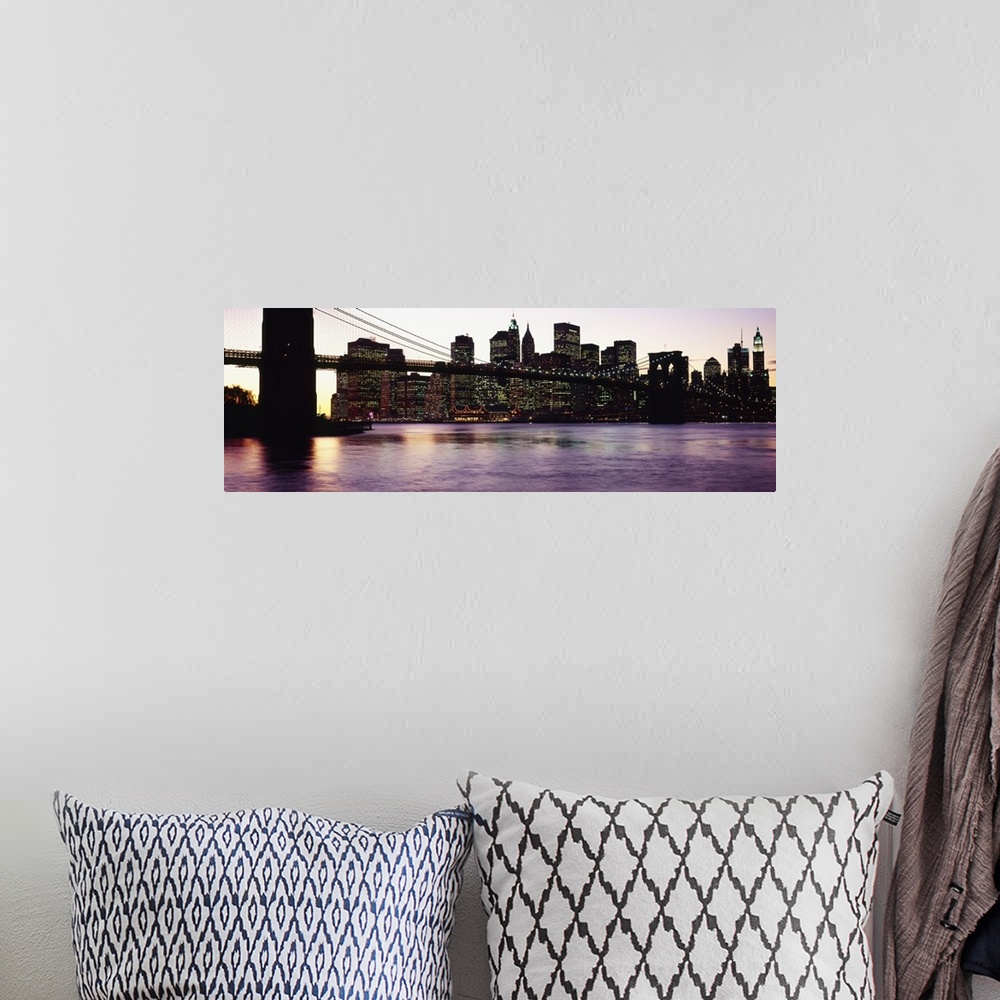 A bohemian room featuring This decorative wall art is a panoramic photograph taken from ground level of the base of the sus...