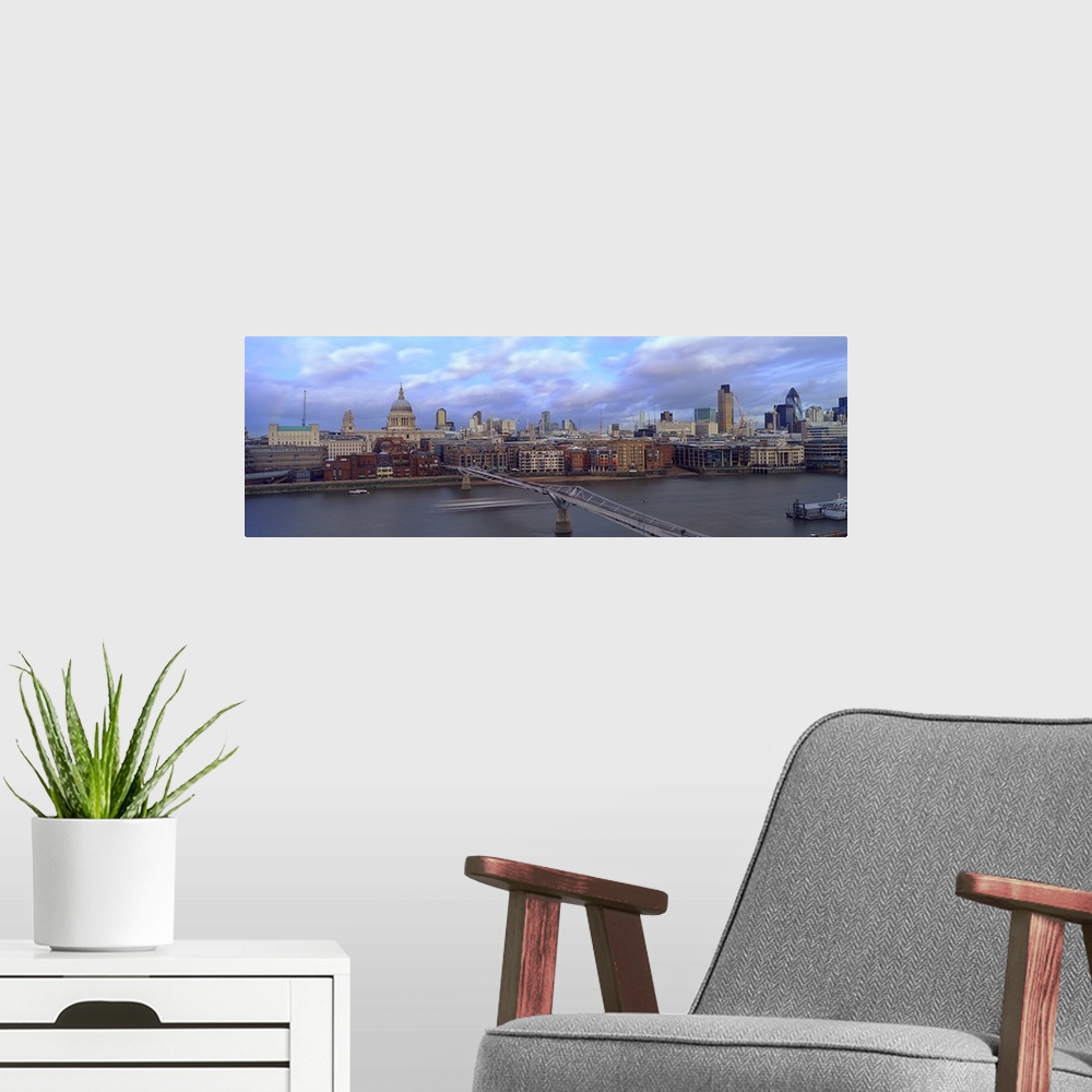 A modern room featuring Bridge across a river, London Millennium Footbridge, Tate Modern, St. Paul's Cathedral, London, E...