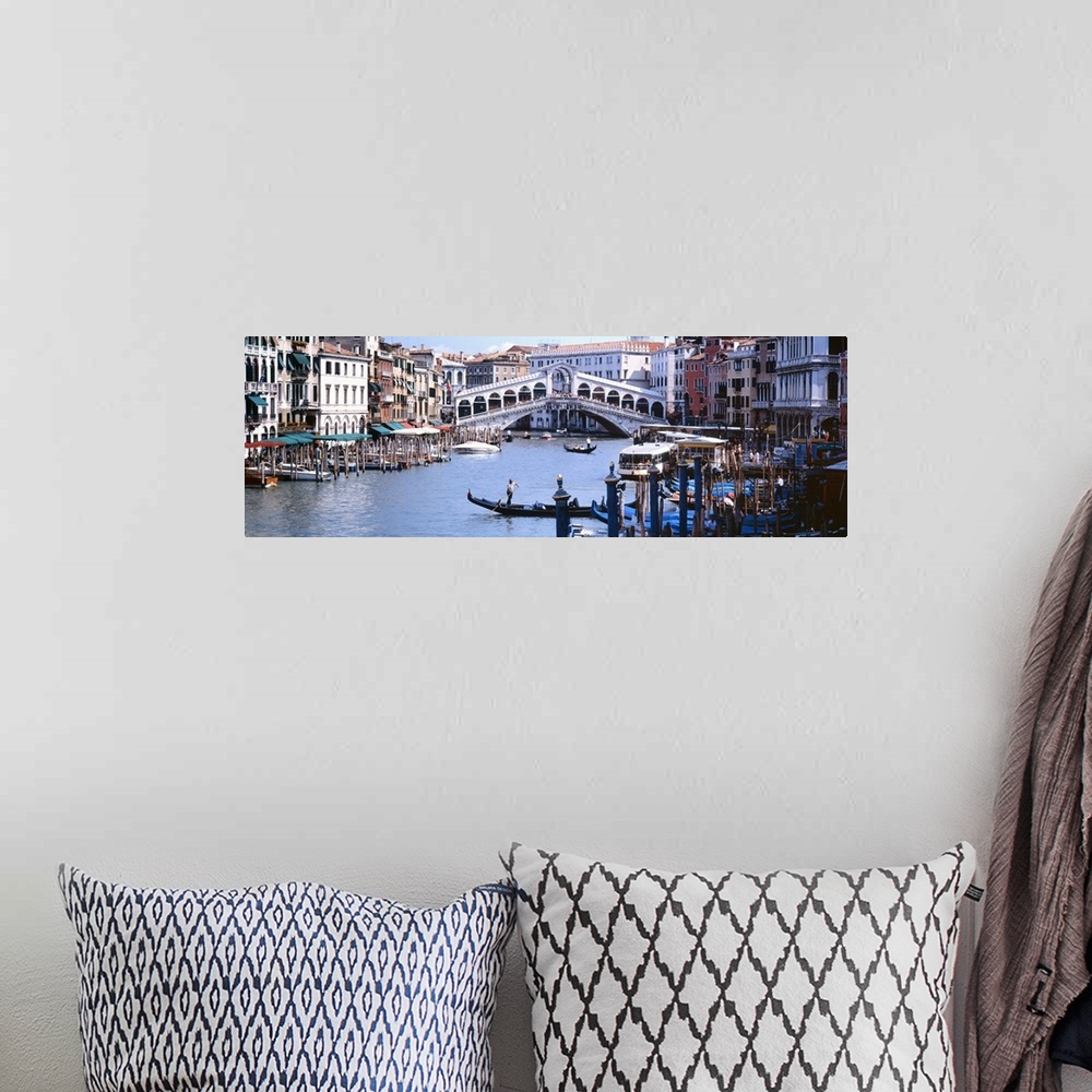 A bohemian room featuring Panoramic photograph of the Grand Canal in Venice, Italy.  View of the Rialto Bridge in the backg...