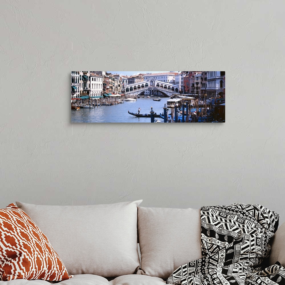 A bohemian room featuring Panoramic photograph of the Grand Canal in Venice, Italy.  View of the Rialto Bridge in the backg...