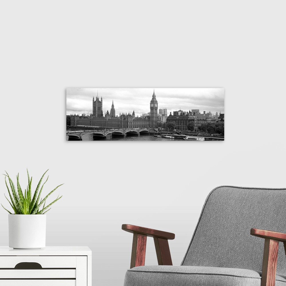 A modern room featuring Panoramic photograph taken in Westminster focuses on Big Ben, the Houses of Parliament and the We...