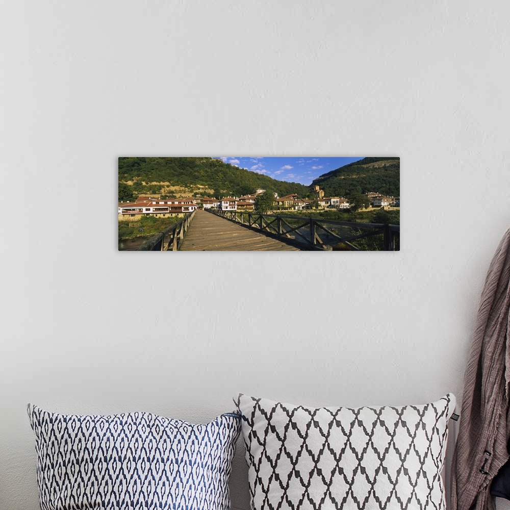 A bohemian room featuring Bridge across a river with a city in the background, Veliko Tarnovo, Bulgaria