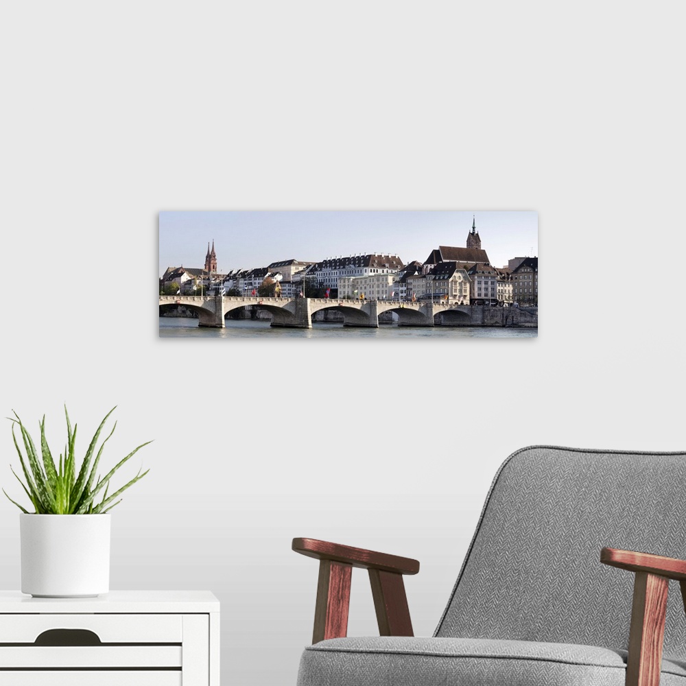 A modern room featuring Bridge across river, St. Martin's Church, River Rhine, Basel, Switzerland
