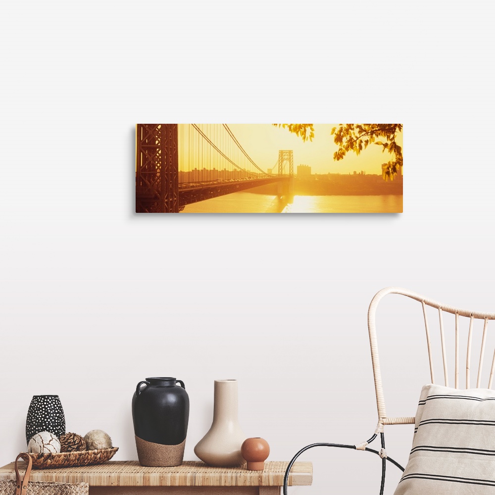A farmhouse room featuring Panorama photograph taken of the George Washington bridge during sun down which gives the picture...