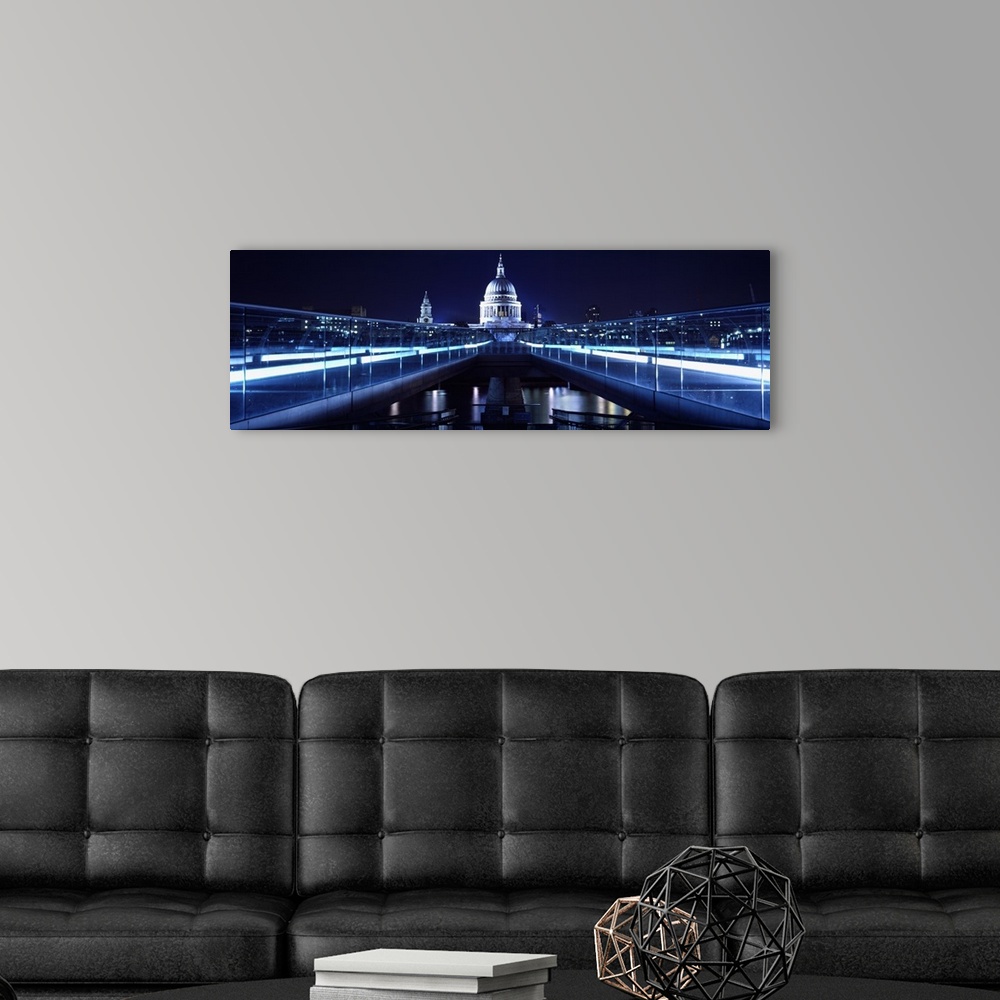 A modern room featuring Bridge lit up at night, Millennium Bridge, Thames River, St Paul's Cathedral, London, England