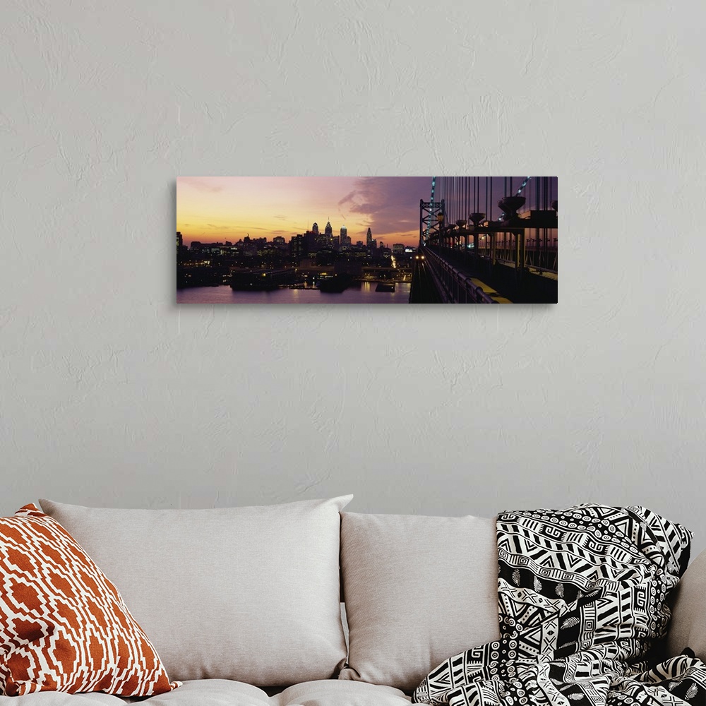 A bohemian room featuring Panoramic photograph shows skyscrapers in lively city within the Northeastern United States start...