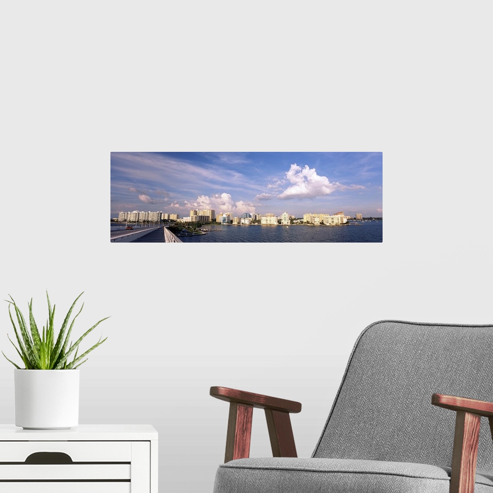 A modern room featuring Bridge with city skyline at the waterfront, John Ringling Causeway Bridge, Sarasota Bay, Sarasota...
