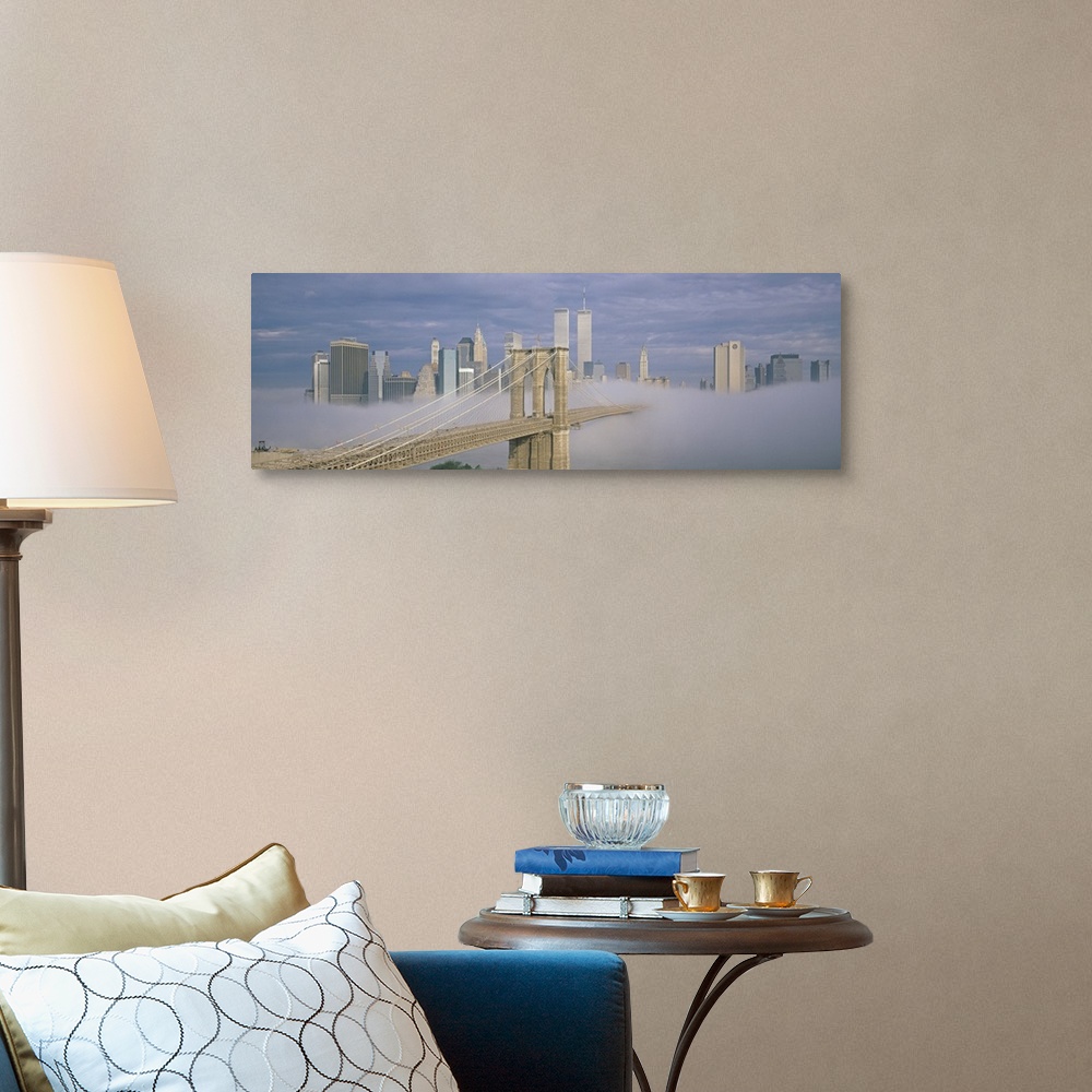 A traditional room featuring Panoramic photo on canvas of a bridge leading to the NYC skyline poking out of the fog.