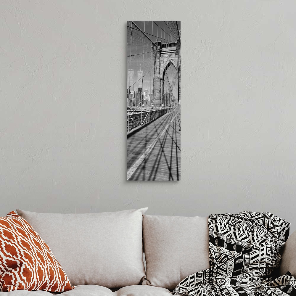 A bohemian room featuring This vertical panoramic shaped photograph taken before 2001 shows one of the suspension towers of...