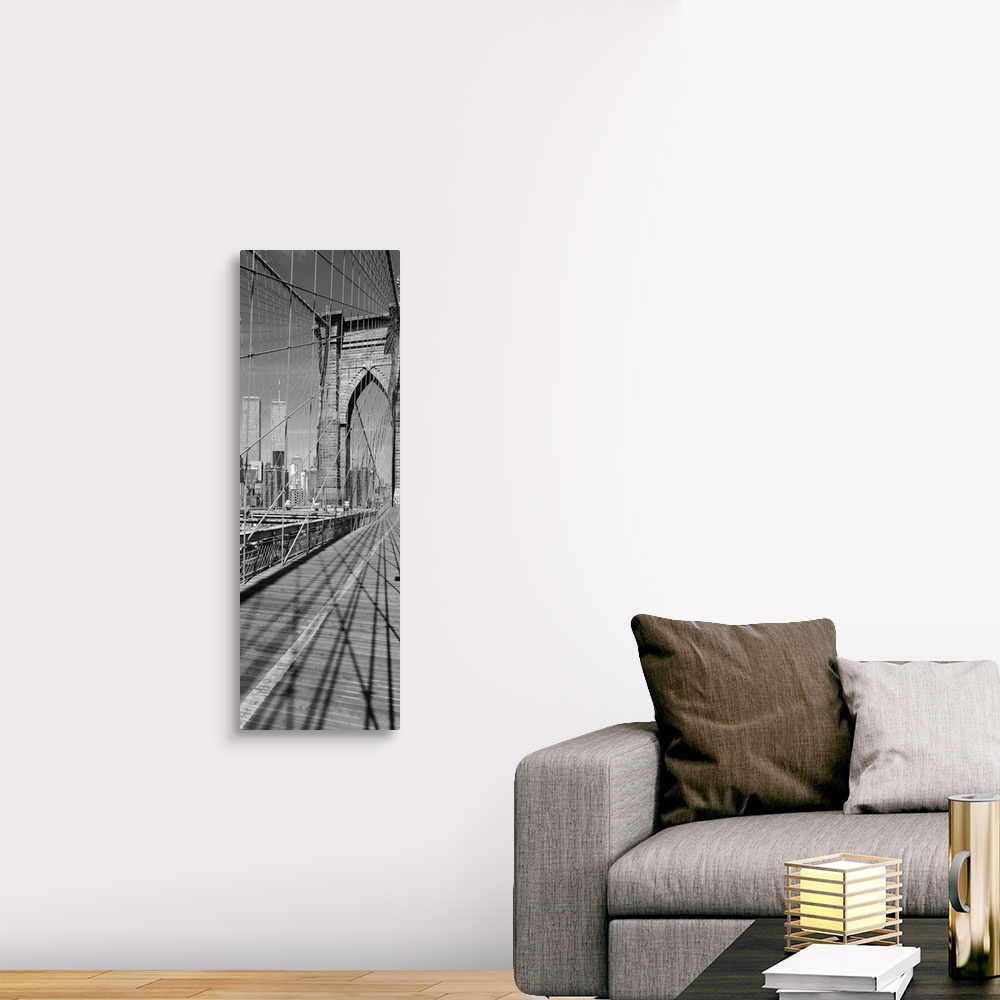 A traditional room featuring This vertical panoramic shaped photograph taken before 2001 shows one of the suspension towers of...