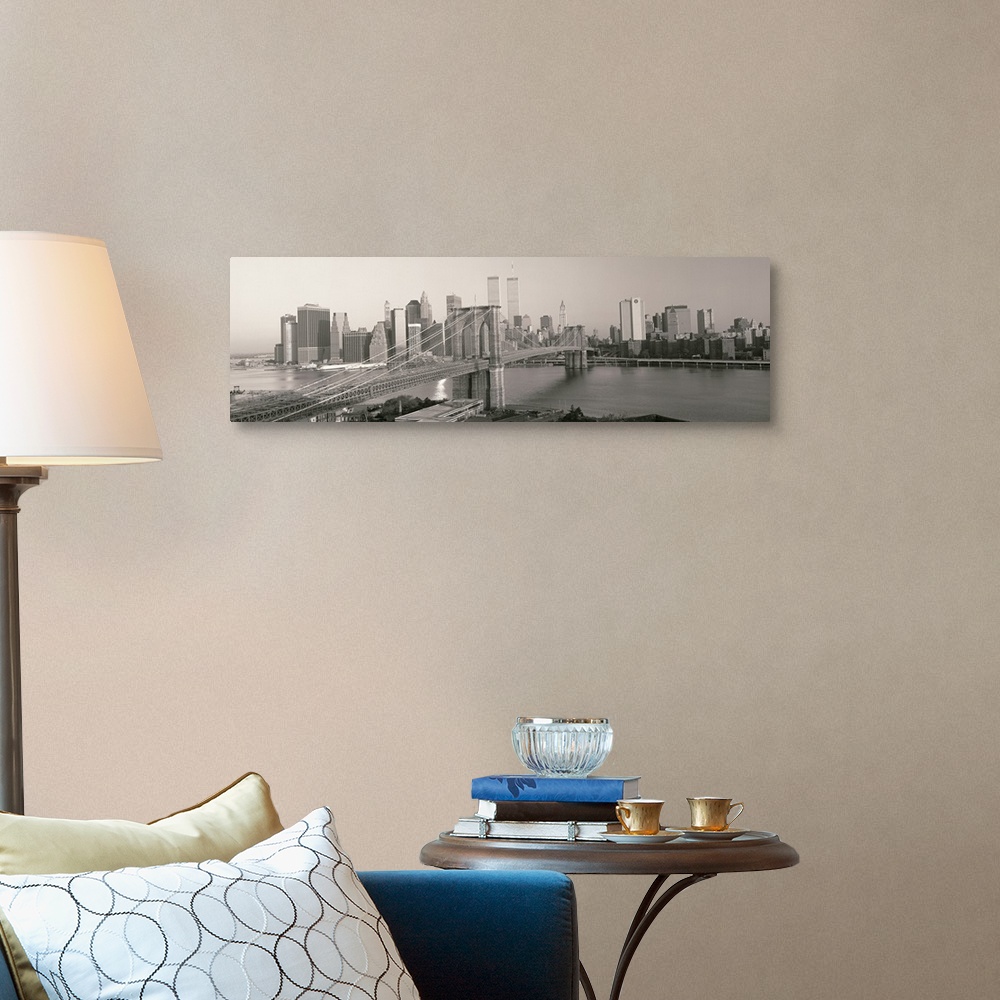 A traditional room featuring Panorama of Manhattan skyline and the Brooklyn Bridge in black and white and grayscale tones.